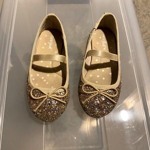 Gold glitter slip ons